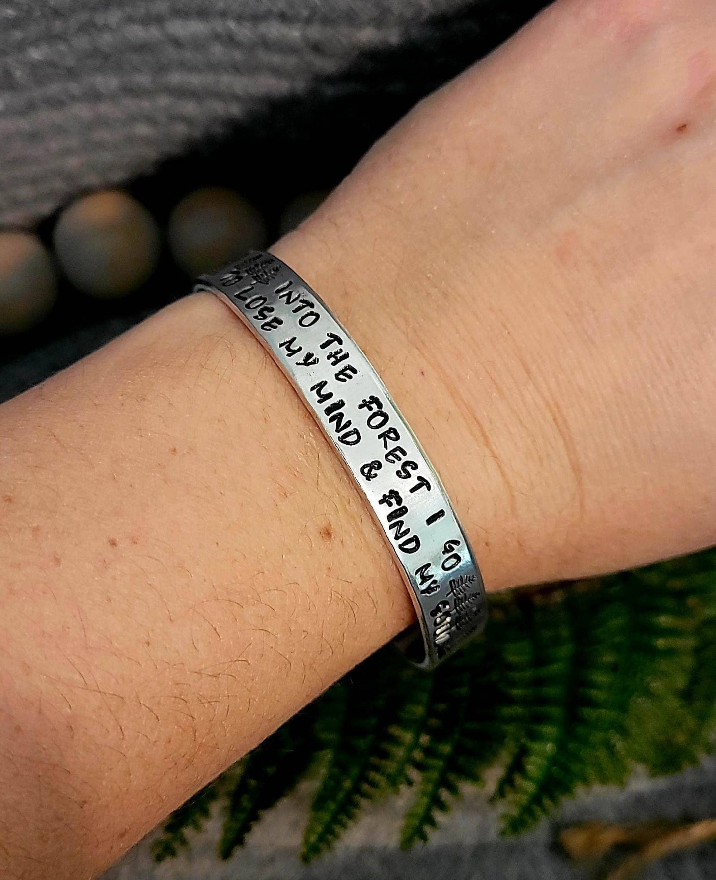 Hand stamped into the forest I go aluminum cuff