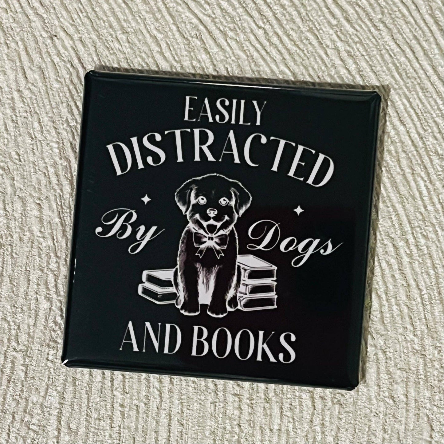 EASILY DISTRACTED BY DOGS AND BOOKS 2x2 SQUARE MAGNET